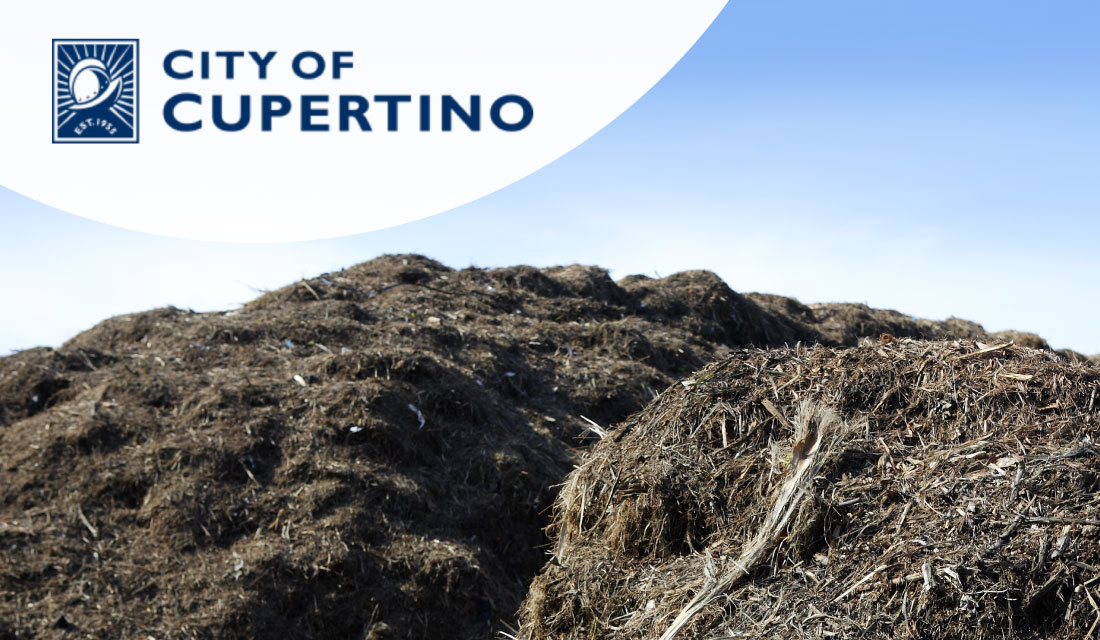 Large compost pile with City of Cupertino logo